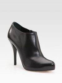 Sleek, low-cut leather style with a silvertone CD emblem at the heel. Self-covered heel, 4½ (115mm) Covered platform, ½ (15mm) Compares to a 4 heel (100mm) Leather upper Leather lining and sole Padded insole Made in Italy Sleek, low-cut leather style with a silvertone CD emblem at the heel. Self-covered heel, 4½ (115mm) Covered platform, ½ (15mm) Compares to a 4 heel (100mm) Leather upper Leather lining and sole Padded insole Made in Italy