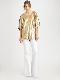 Sparkling sequined mesh shaped with soft dolman sleeves in a slightly oversized silhouette.BoatneckDropped shouldersDolman sleevesScoopbackHem longer in backAbout 27 from shoulder to hemNylonDry cleanImportedModel shown is 5'10 (177cm) wearing US size 4. Sparkling sequined mesh shaped with soft dolman sleeves in a slightly oversized silhouette.BoatneckDropped shouldersDolman sleevesScoopbackHem longer in backAbout 27 from shoulder to hemNylonDry cleanImportedModel shown is 5'10 (177cm) wearing US size 4.
