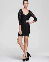Laced with plenty of lovely appeal, this GUESS dress is everyone's favorite party guest. Laced with plenty of lovely appeal, this GUESS dress is everyone's favorite party guest.