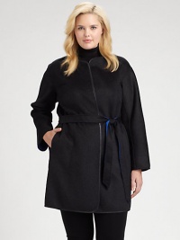 In this coat, you will surely receive compliments, thanks to its buttery leather trim. This impeccable design also features a waist-defining, reversible belt and contrast lining offering brilliant color pops.Feminine necklineSelf-tie beltSlash pocketsLeather trimAbout 36 from shoulder to hemWool/angoraDry clean by leather specialistImported In this coat, you will surely receive compliments, thanks to its buttery leather trim. This impeccable design also features a waist-defining, reversible belt and contrast lining offering brilliant color pops.Feminine necklineSelf-tie beltSlash pocketsLeather trimAbout 36 from shoulder to hemWool/angoraDry clean by leather specialistImported