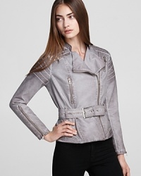 Rev up your fall wardrobe with this chicly-cropped GUESS jacket--designed from soft faux leather and belted for a flattering pulled-together look. Rev up your fall wardrobe with this chicly-cropped GUESS jacket--designed from soft faux leather and belted for a flattering pulled-together look.