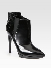 An architectural point toe design of smooth leather, supported by a platform and high heel. Self-covered heel, 4¾ (120mm)Island platform, ½ (15mm)Compares to a 4¼ heel (110mm)Leather upper with elastic insertsPull-on stylePoint toeLeather lining and solePadded insoleMade in Italy An architectural point toe design of smooth leather, supported by a platform and high heel. Self-covered heel, 4¾ (120mm)Island platform, ½ (15mm)Compares to a 4¼ heel (110mm)Leather upper with elastic insertsPull-on stylePoint toeLeather lining and solePadded insoleMade in Italy