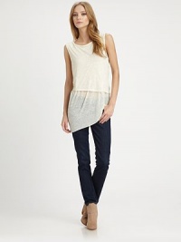 Semi-sheer jersey knit layers asymmetrically to create an uneven hem.ScoopneckSleevelessCropped overlayAsymmetrical hemAbout 30 from shoulder to hem75% polyester/25% cottonMachine washImportedModel shown is 5'10 (178cm) wearing US size Small. Semi-sheer jersey knit layers asymmetrically to create an uneven hem.ScoopneckSleevelessCropped overlayAsymmetrical hemAbout 30 from shoulder to hem75% polyester/25% cottonMachine washImportedModel shown is 5'10 (178cm) wearing US size Small.