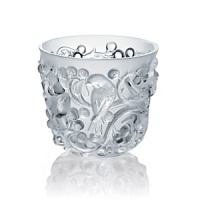 In 2010, to celebrate the 150th anniversary of René Lalique's birth in 1860, LALIQUE created the Hommage à René Lalique collection. In this collection, Lalique re-examines and reinterprets iconic glass creations of Rene Lalique. The Avallon vase is reissued in clear crystal from the original 1927 design featuring birds indulging in abundant sweet grapes while the vine creates the exceptional rhythm of this composition. This vase takes us into a dreamlike state and a poetic universe. In 2010, to celebrate the 150th anniversary of René Lalique's birth in 1860, LALIQUE created the Hommage à René Lalique collection. In this collection, Lalique re-examines and reinterprets iconic glass creations of Rene Lalique. The Avallon vase is reissued in clear crystal from the original 1927 design featuring birds indulging in abundant sweet grapes while the vine creates the exceptional rhythm of this composition. This vase takes us into a dreamlike state and a poetic universe.