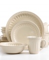 Shift into neutral. Add a touch of tradition to your table with this distinctive dinnerware set from Gibson. Fluted details meld with a muted hue, steeping any occasion in old-world charm.