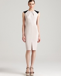 Irreverent shoulder accents put an unexpected spin on the classic Rachel Roy sheath dress. Punctuate the clean silhouette with metallic accents for modern elegance. Irreverent shoulder accents put an unexpected spin on the classic Rachel Roy sheath dress. Punctuate the clean silhouette with metallic accents for modern elegance.