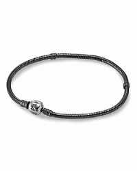Inspired by the design of PANDORA's iconic bracelets, this oxidized sterling silver necklace beautifully displays dozens of charms and clips. A polished signature clasp adds a bright touch. Inspired by the design of PANDORA's iconic bracelets, this oxidized sterling silver necklace beautifully displays dozens of charms and clips. A polished signature clasp adds a bright touch.