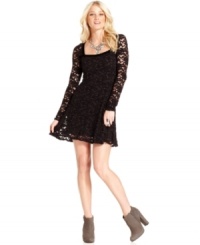 A back cutout adds eye-catching appeal to this Free People lace dress for a flirty, feminine look! A back cutout adds eye-catching appeal to this Free People lace dress for a flirty, feminine look!