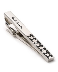 An abbreviated houndstooth pattern fronts this cool tie clip from Paul Smith, offering a contrast pattern to your dressed-up attire. An abbreviated houndstooth pattern fronts this cool tie clip from Paul Smith, offering a contrast pattern to your dressed-up attire.