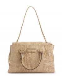 Be the chicest fashionista in the office with the Alexandrite Briefcase Flap Bag from Ivanka Trump. A glossy exterior sets the foundation for gleaming goldtone hardware and a daring chain embellished strap. Be the chicest fashionista in the office with the Alexandrite Briefcase Flap Bag from Ivanka Trump. A glossy exterior sets the foundation for gleaming goldtone hardware and a daring chain embellished strap.