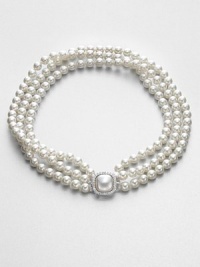 A classic and elegant design with three rows of lustrous white pearls accented with a stone encrusted closure. 8mm white round organic man-made pearlsCubic zirconiaSterling silverLength, about 16Mabe clasp closureImported A classic and elegant design with three rows of lustrous white pearls accented with a stone encrusted closure. 8mm white round organic man-made pearlsCubic zirconiaSterling silverLength, about 16Mabe clasp closureImported