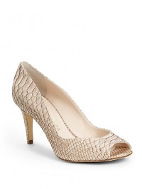 THE LOOKPeep toeSnakeskin-embossed leather with golden touchesCurved openingPadded insoleTHE FITSelf-covered heel 2½ (65mm)THE MATERIALSnake-embossed leather upperLeather lining and soleORIGINMade in Italy THE LOOKPeep toeSnakeskin-embossed leather with golden touchesCurved openingPadded insoleTHE FITSelf-covered heel 2½ (65mm)THE MATERIALSnake-embossed leather upperLeather lining and soleORIGINMade in Italy