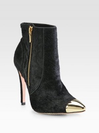 Towering silhouette of luxe pony hair, pumped up with a metal cap toe and exposed zipper. Self-covered heel, 4¼ (110mm)Pony upper with metal cap toeSide exposed zipLeather lining and solePadded insoleImported