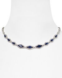 Specially set crystals on this Lora Paolo necklace illuminate intricate rhodium-plated stations that comprise this breathtaking piece. Specially set crystals on this Lora Paolo necklace illuminate intricate rhodium-plated stations that comprise this breathtaking piece.