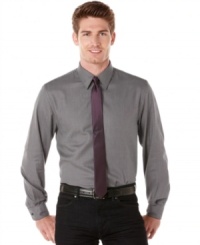 With a classic twill textured pattern, this Perry Ellis shirt makes a great addition to your work-week wardrobe. With a classic twill textured pattern, this Perry Ellis shirt makes a great addition to your work-week wardrobe.