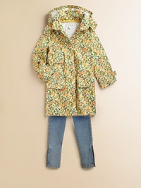 Bright and cheery with colorful fruit pattern, plenty of pockets for all her little necessities, plus a cozy hood to zip on for unpredictable weather.Detachable hood with snap closurePolo collarConcealed front snap closureLong sleeves with button cuffsThree front patch pocketsCottonHand washImported