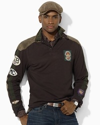 Moto-inspired details and rugged oilcloth patches lend modern edge to a trim-fitting rugby shirt in lightweight utility cotton. Moto-inspired details and rugged oilcloth patches lend modern edge to a trim-fitting rugby shirt in lightweight utility cotton.