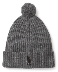 Top off your winter wear with this handsome sporty cap, featuring an allover rib knit and a classic logo on the front. Pair with the matching scarf for a warm, cold weather duo. Top off your winter wear with this handsome sporty cap, featuring an allover rib knit and a classic logo on the front. Pair with the matching scarf for a warm, cold weather duo.