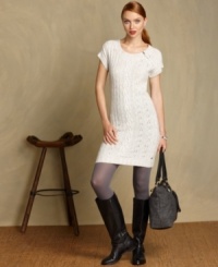 Tommy Hilfiger's classic cable-knit sweater dress offers a body-hugging silhouette and a cozy feel. Try it with tights and riding boots for an on-point ensemble. Tommy Hilfiger's classic cable-knit sweater dress offers a body-hugging silhouette and a cozy feel. Try it with tights and riding boots for an on-point ensemble.