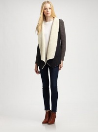 Modern take on the classic coat, this suede like design is styled with contrasting knit sleeves and plush faux shearling trim. Faux shearling shawl collarLong knit sleevesAdjustable back cordFaux shearling liningBody: PolyesterTrim: 50% acrylic/30% wool/20% nylonHand washImportedModel shown is 5'10 (177cm) wearing US size Small. Modern take on the classic coat, this suede like design is styled with contrasting knit sleeves and plush faux shearling trim. Faux shearling shawl collarLong knit sleevesAdjustable back cordFaux shearling liningBody: PolyesterTrim: 50% acrylic/30% wool/20% nylonHand washImportedModel shown is 5'10 (177cm) wearing US size Small.