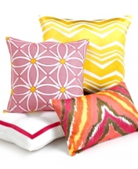 A single hot pink stripe border embellishes this Coachella decorative pillow from Trina Turk. Finished with a tufted covered button at the center. A single hot pink stripe border embellishes this Coachella decorative pillow from Trina Turk. Finished with a tufted covered button at the center.