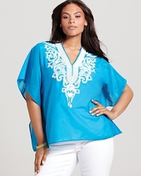 Lend a touch of boho-chic to your daily repertoire with this Karen Kane Plus top touting glistening metallic embroidery. Lend a touch of boho-chic to your daily repertoire with this Karen Kane Plus top touting glistening metallic embroidery.