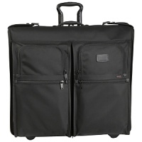 Slim and sleek, this garment cover is an effortless way to carry and protect a single suit or garment. It features an outside U-zip pocket for a travel kit or shoes and interior accessories pockets. Made from Tumi's signature ballistic nylon, it comes with its own hanger with a comfortable leather handle grip.Dimensions: 21 x 23.5 - H xW Slim and sleek, this garment cover is an effortless way to carry and protect a single suit or garment. It features an outside U-zip pocket for a travel kit or shoes and interior accessories pockets. Made from Tumi's signature ballistic nylon, it comes with its own hanger with a comfortable leather handle grip.Dimensions: 21 x 23.5 - H xW
