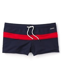 Swim trunks for your trip to Ibiza, Turks & Caicos or the neighbor's pool, designed by Parke & Ronen with a contrast band for colorful flair. Swim trunks for your trip to Ibiza, Turks & Caicos or the neighbor's pool, designed by Parke & Ronen with a contrast band for colorful flair.