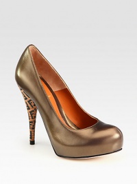 Timeless silhouette of metallic leather with a monogram-embellished stacked heel. Stacked heel, 4½ (115mm)Covered platform, ¾ (20mm)Compares to a 3¾ heel (95mm)Leather upperLeather lining and solePadded insoleMade in Italy Timeless silhouette of metallic leather with a monogram-embellished stacked heel. Stacked heel, 4½ (115mm)Covered platform, ¾ (20mm)Compares to a 3¾ heel (95mm)Leather upperLeather lining and solePadded insoleMade in Italy