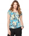 Style&co.'s petite floral-printed top is the solution for a what-to-wear quandary. Pair with jeans or simple black pants for an ensemble in an instant!