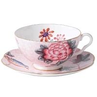 Step into a delightful garden party with Wedgwood's whimsical Cuckoo collection. Inspired by nature, this richly accented tea cup and saucer adds a flourish of color to your table with sophisticated and lively style. Step into a delightful garden party with Wedgwood's whimsical Cuckoo collection. Inspired by nature, this richly accented tea cup and saucer adds a flourish of color to your table with sophisticated and lively style.