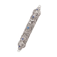 A stunning mezuzah with intricate filigree work, a silver-tone metal finish and hand-set aquamarine Swarovski® crystals. A stunning mezuzah with intricate filigree work, a silver-tone metal finish and hand-set aquamarine Swarovski® crystals.