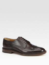 Leather lace-up derby with cap-toe and brogue detailing.Leather soleMade in Italy Leather lace-up derby with cap-toe and brogue detailing.Leather soleMade in Italy