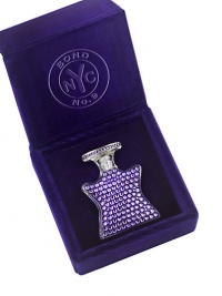 The mini-bejeweled star is encrusted in Swarovski crystals and filled with Central Park West eau de parfum. Includes a velvet jewel box. 0.17 oz. Made in USA. 