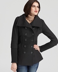 Bring classic style to your winter looks with this expertly cut double-breasted coat from Andrew Marc. Bring classic style to your winter looks with this expertly cut double-breasted coat from Andrew Marc.