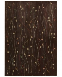 With a flowing floral motif, this area rug offers an organic appeal to your decor. Vines intertwine over a rich chocolate background, each branch hand-carved to add that extra dimension and eye-pleasing interest. With a flowing floral motif, this area rug offers an organic appeal to your decor. Vines intertwine over a rich chocolate background, each branch hand-carved to add that extra dimension and eye-pleasing interest.