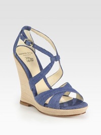 Delectable denim with a dainty, adjustable ankle strap and stacked wooden wedge. Stacked wooden wedge, 5 (125mm)Covered platform, ¾ (20mm)Compares to a 4¼ heel (110mm)Denim upperLeather liningBuffed leather solePadded insoleImportedOUR FIT MODEL RECOMMENDS ordering true size. Delectable denim with a dainty, adjustable ankle strap and stacked wooden wedge. Stacked wooden wedge, 5 (125mm)Covered platform, ¾ (20mm)Compares to a 4¼ heel (110mm)Denim upperLeather liningBuffed leather solePadded insoleImportedOUR FIT MODEL RECOMMENDS ordering true size.