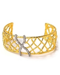 Artfully glam, Alexis Bittar's woven cuff is your instant outfit refresher. Take your cues from the runways and wear this webby pick-up with a sequin-splashed mini and slick heels.