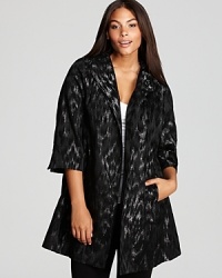 Classic jacquard goes contemporary chic as blurred brushstrokes shake up a sharply-tailored Eileen Fisher Plus coat. Classic jacquard goes contemporary chic as blurred brushstrokes shake up a sharply-tailored Eileen Fisher Plus coat.