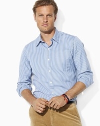 A trim-fitting sport shirt is woven from crisp cotton and adorned with polished stripes and a classic patch pocket at the left chest for timeless style. A trim-fitting sport shirt is woven from crisp cotton and adorned with polished stripes and a classic patch pocket at the left chest for timeless style.