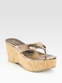 An exaggerated cork wedge lifts this seasonal essential, pairing metallic trim with snake-print leather for textured appeal. Cork wedge, 3 (75mm)Cork platform, 1½ (40mm)Compares to a 1½ heel (40mm)Snake-print leather and metallic leather upperMetallic leather liningRubber solePadded insoleMade in Italy An exaggerated cork wedge lifts this seasonal essential, pairing metallic trim with snake-print leather for textured appeal. Cork wedge, 3 (75mm)Cork platform, 1½ (40mm)Compares to a 1½ heel (40mm)Snake-print leather and metallic leather upperMetallic leather liningRubber solePadded insoleMade in Italy