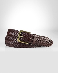 A sleek braided belt exudes timeless style in a supple leather construction. A sleek braided belt exudes timeless style in a supple leather construction.