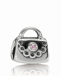 PANDORA's ladylike handbag charm gets a splash of color courtesy of pink cubic zirconia. PANDORA's ladylike handbag charm gets a splash of color courtesy of pink cubic zirconia.