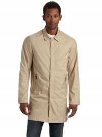 Unique packable style that's designed for easy travel, this ultra light and water resistant rain gear packs into itself for ultimate convenience.Point collar Front zipper with snap storm flap Long sleeves Dual zip pockets One inside zip pocketFully lined About 34 from shoulder to hem Polyester; hand wash Imported Unique packable style that's designed for easy travel, this ultra light and water resistant rain gear packs into itself for ultimate convenience.Point collar Front zipper with snap storm flap Long sleeves Dual zip pockets One inside zip pocketFully lined About 34 from shoulder to hem Polyester; hand wash Imported