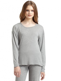 THE LOOKRoundneckPullover styleLong sleevesLonger curved back hemTHE FITAbout 24 from shoulder to hemTHE MATERIALCotton/rayonCARE & ORIGINMachine washImported