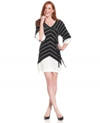 Studio M's latest sweater dress features a bold chevron pattern and a soft fabrication. Studio M's latest sweater dress features a bold chevron pattern and a soft fabrication.