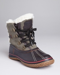 Stay stylishly warm in Pajar's Iceland booties, featuring a chic lace up back and lined with cozy, breathable wool. Stay stylishly warm in Pajar's Iceland booties, featuring a chic lace up back and lined with cozy, breathable wool.