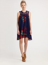 Vibrant florals highlight this gathered shift finished with cut-out embroidery at the neckline.JewelneckSleevelessTop-button back keyholePolyesterHand washMade in USAModel shown is 5'11 (180cm) wearing US size Small. Vibrant florals highlight this gathered shift finished with cut-out embroidery at the neckline.JewelneckSleevelessTop-button back keyholePolyesterHand washMade in USAModel shown is 5'11 (180cm) wearing US size Small.