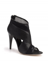 Sumptuous leather fuses with breezy mesh straps for a towering statement, day or night.Leather-covered heel 4 (100mm) Open toe Adjustable ankle strap Leather lining and sole Padded insole Made in Italy Sumptuous leather fuses with breezy mesh straps for a towering statement, day or night.Leather-covered heel 4 (100mm) Open toe Adjustable ankle strap Leather lining and sole Padded insole Made in Italy