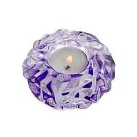 Inspired by the natural opulence of dazzling gemstones, designer Lena Bergström has crafted this brilliant votive in the true spirit of Orrefors for a sparkly addition to your home décor.